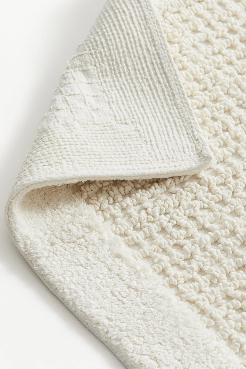 Tapis de bain en coton touffeté