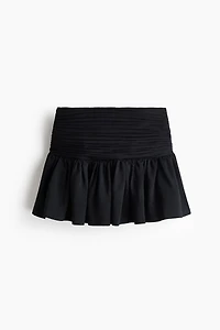Minijupe à taille plissée