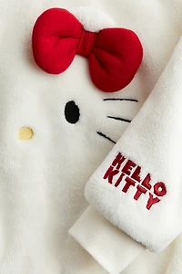 Chandail en tissu peluche avec motifs