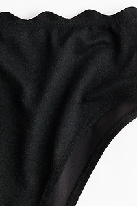 Culotte de bikini audacieuse échancrée