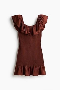 Robe épaules nues à volants