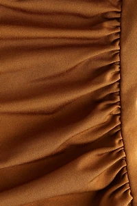 Robe en jersey à effet drapé