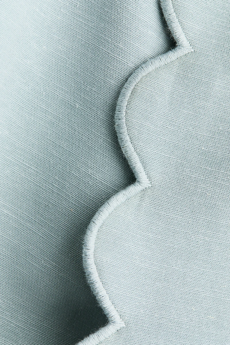 Veste à bords festonnés