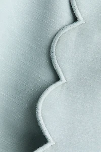 Veste à bords festonnés