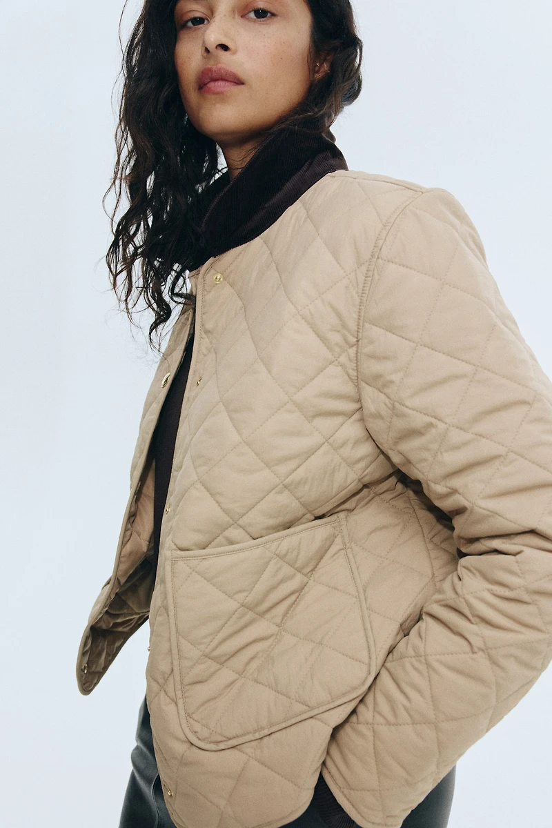 Veste matelassée avec col en velours côtelé