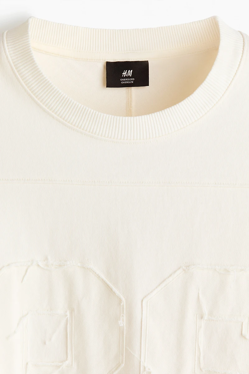 T-shirt grande taille en coton avec motifs