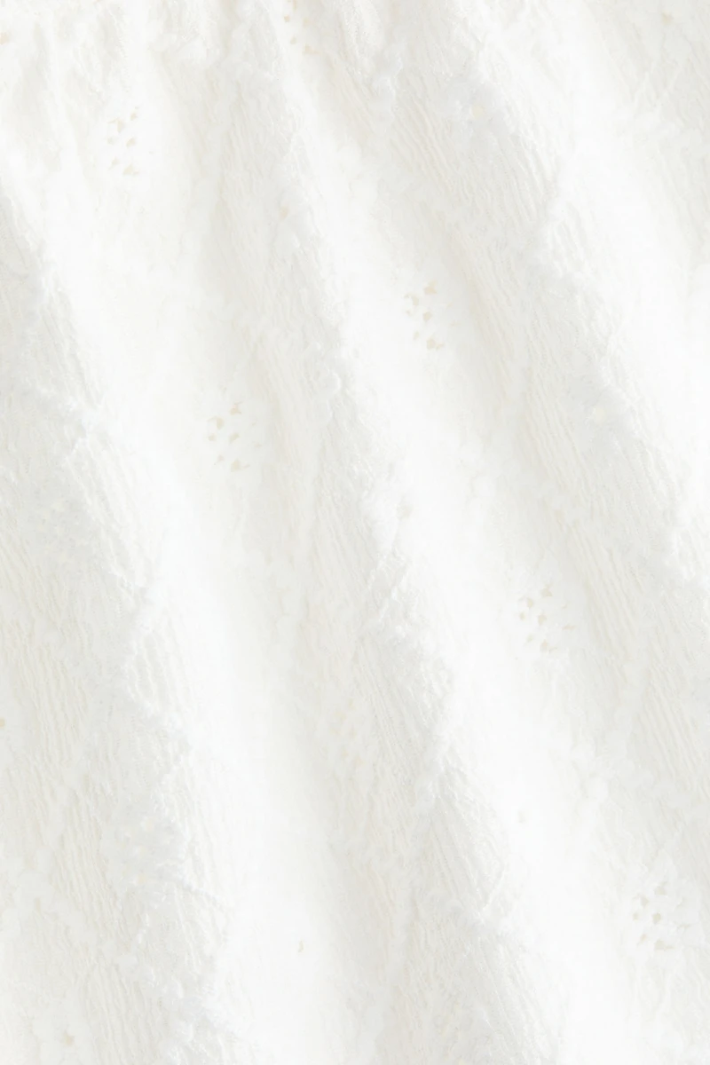 Blouse en jersey pointelle