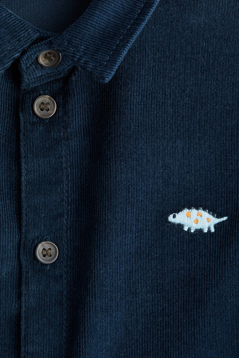 Chemise en velours côtelé avec motifs brodés