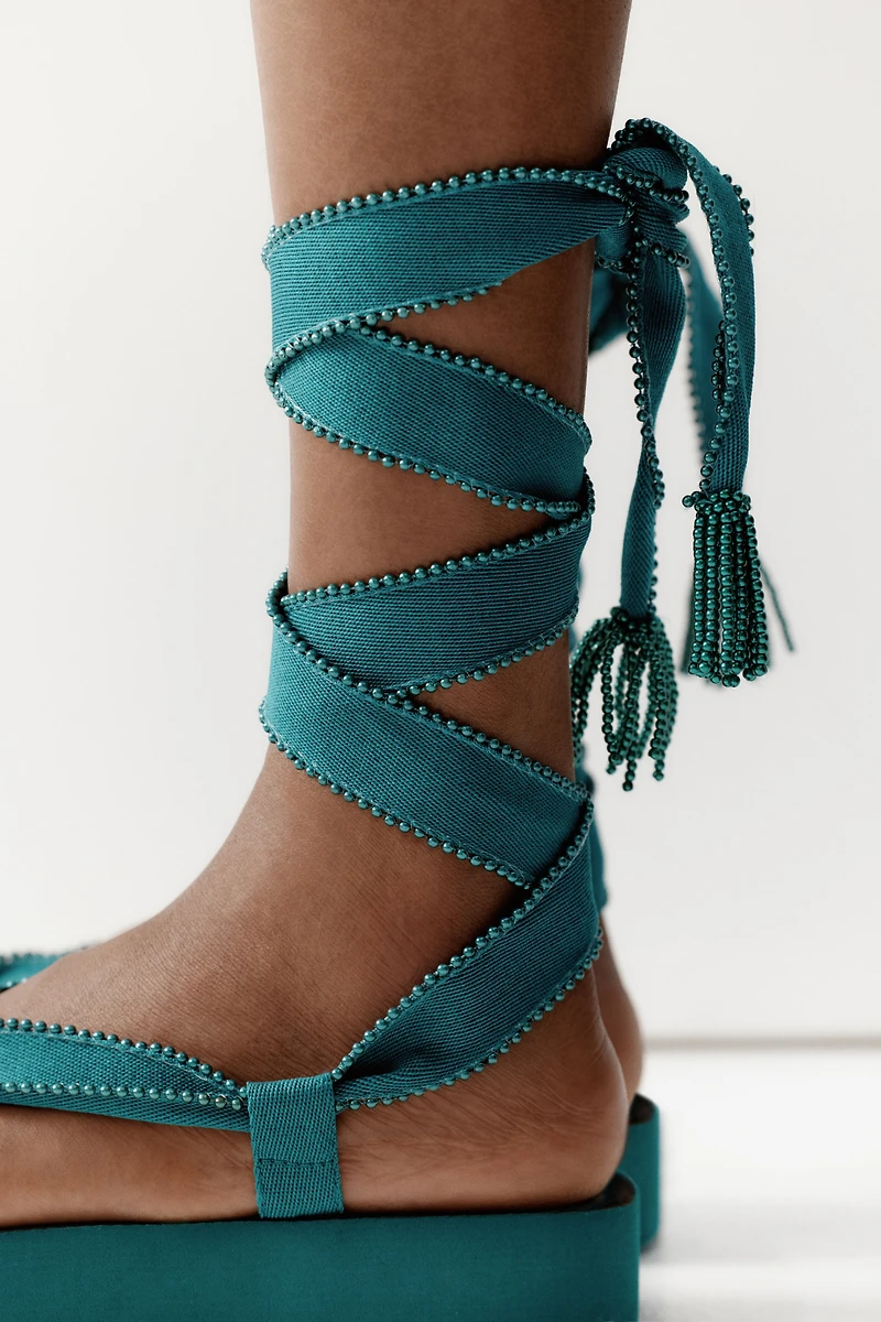 Tie-Detail Flatform Flip-Flops