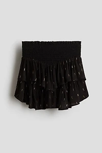 Jupe smockée à volants