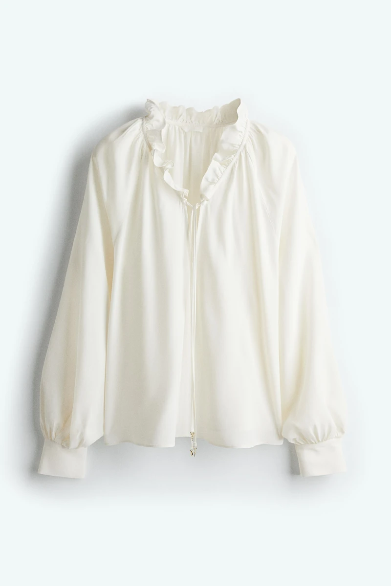 Blouse volantée avec cordon de serrage