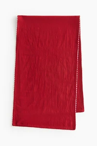 Chemin de table à bords festonnés