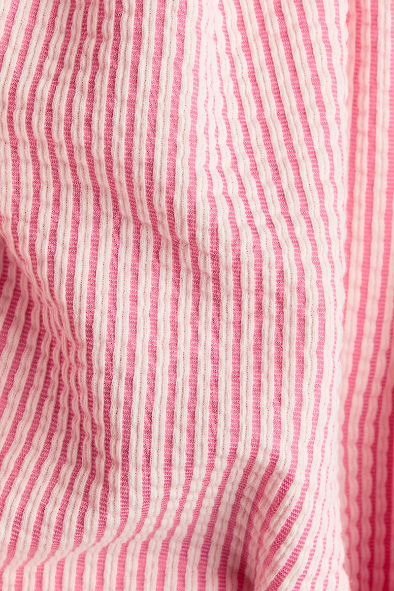 Robe avec boucle devant