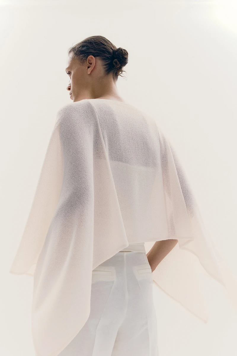 Cape en tricot fin