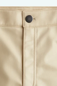 Pantalon en tissu enduit