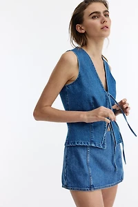 Gilet sans manches en denim avec liens à nouer