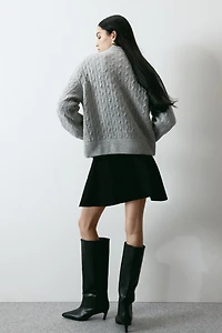 Blouson aviateur en tricot torsadé