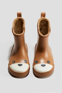 Bottes en caoutchouc doublées de polar