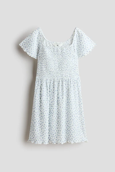 Robe à corsage en nid d'abeille