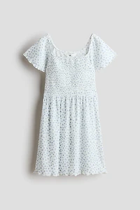 Robe à corsage en nid d'abeille