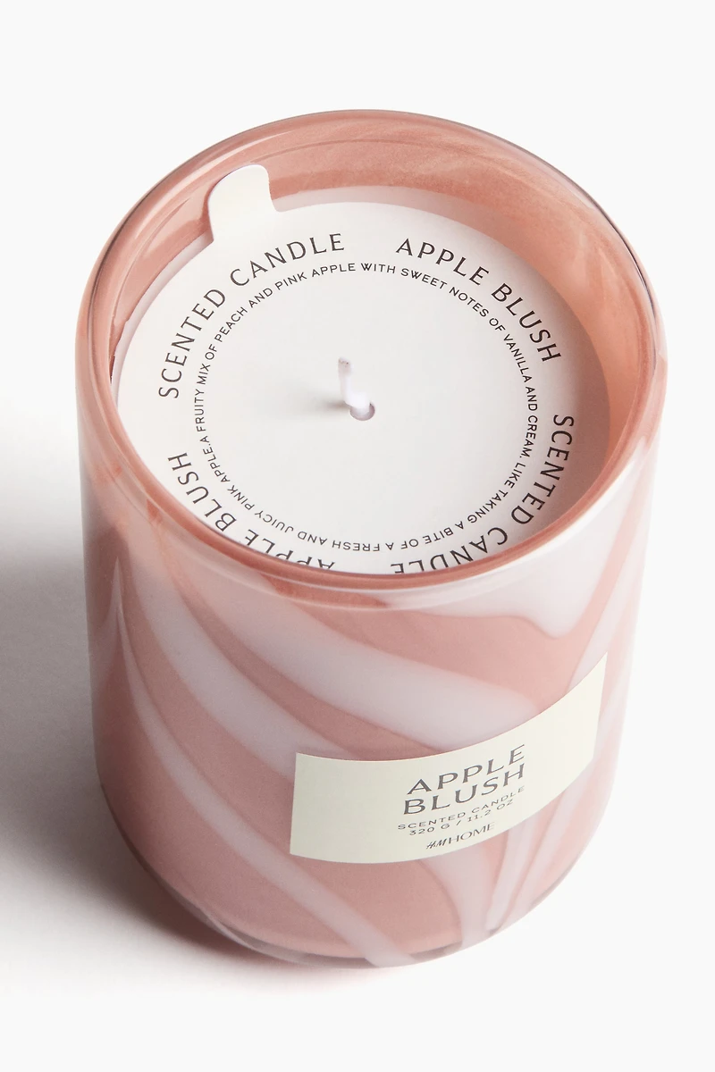 Bougie parfumée dans un pot en verre