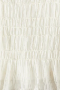 Smocked Peplum Top