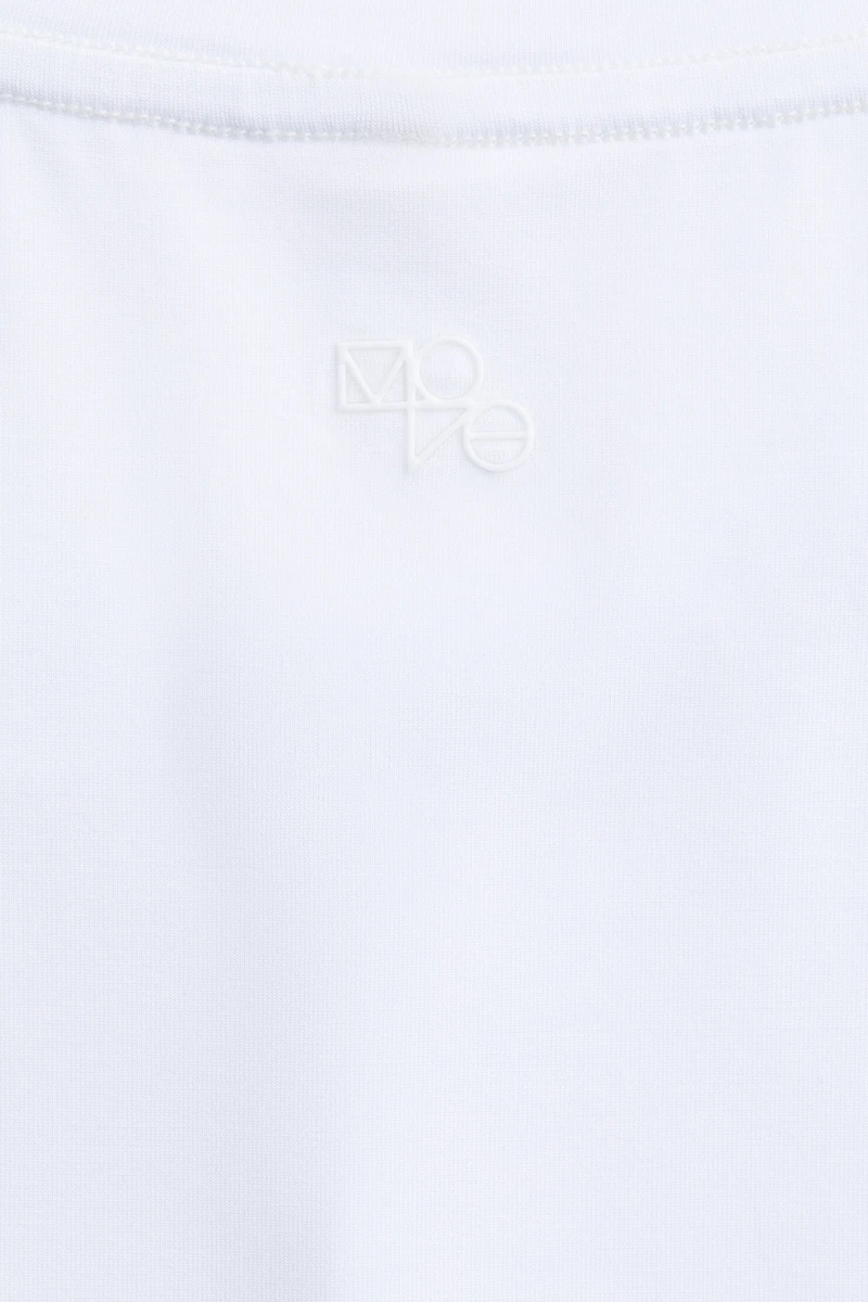 Haut de Pilates avec détail torsadé