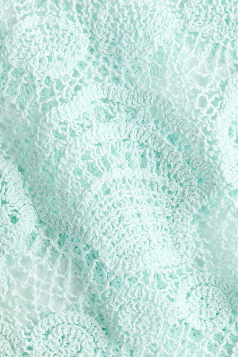 Haut d'aspect crocheté avec motifs