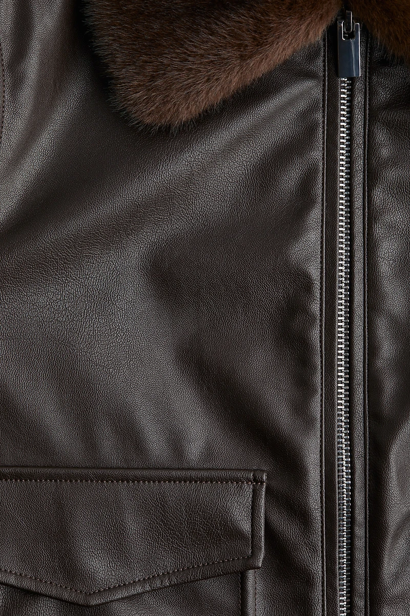 Veste en tissu enduit avec col