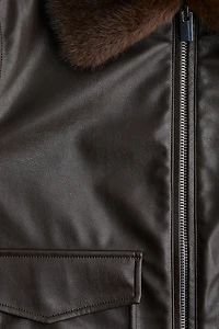 Veste en tissu enduit avec col