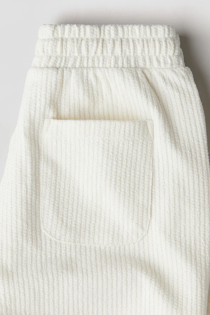 Short en tricot texturée