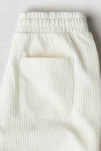 Short en tricot texturée