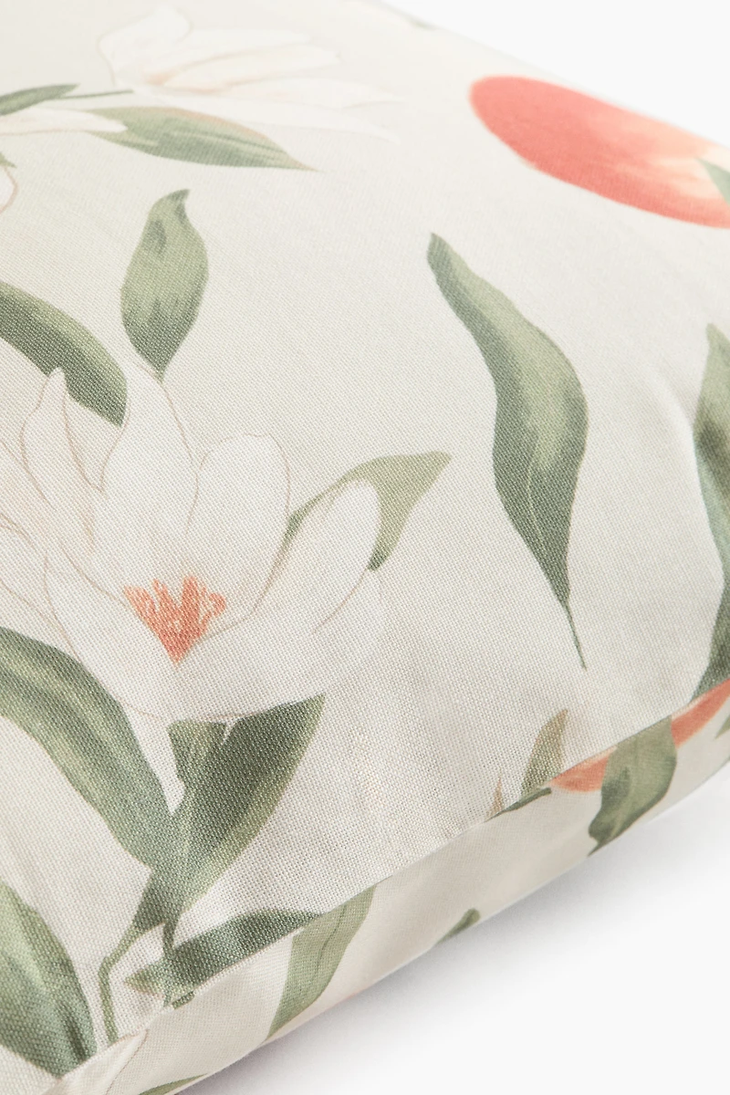 Housse de coussin à motif