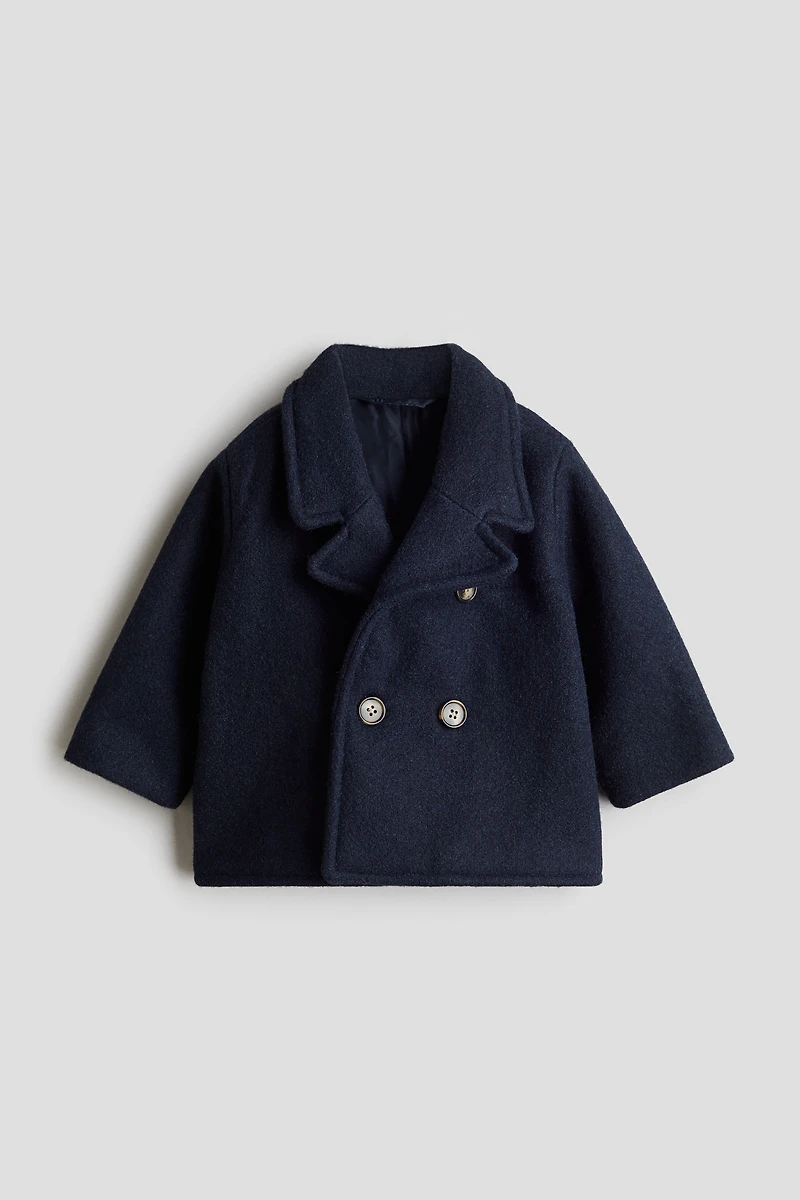 Manteau à fermeture croisée