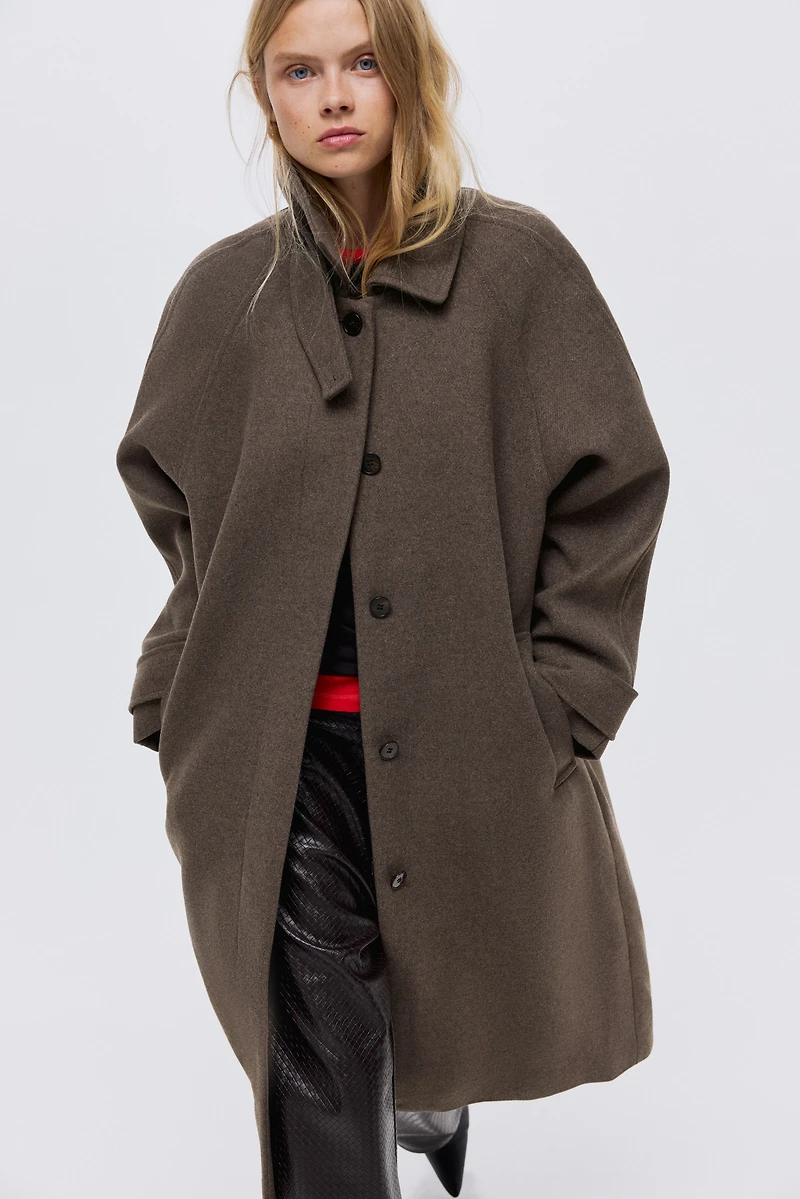 Manteau avec ceinture à nouer
