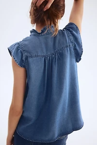 Ruffle-Trimmed Denim Blouse