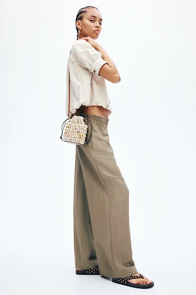 Wide-Leg Ruffle-Trimmed Pants