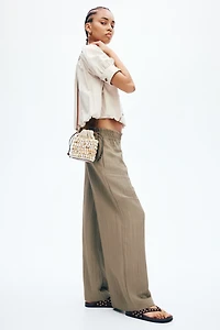Wide-Leg Ruffle-Trimmed Pants