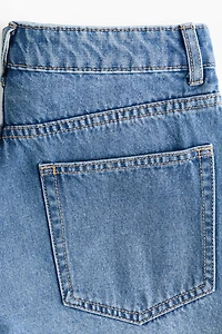 Raw-edge denim shorts