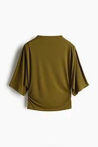 Haut à effet drapé