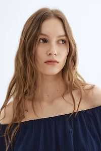 Haut court épaules nues