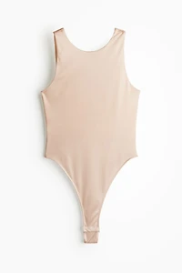 Combiné à culotte ficelle avec dos décolleté