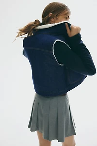 Veste sans manches double face en denim