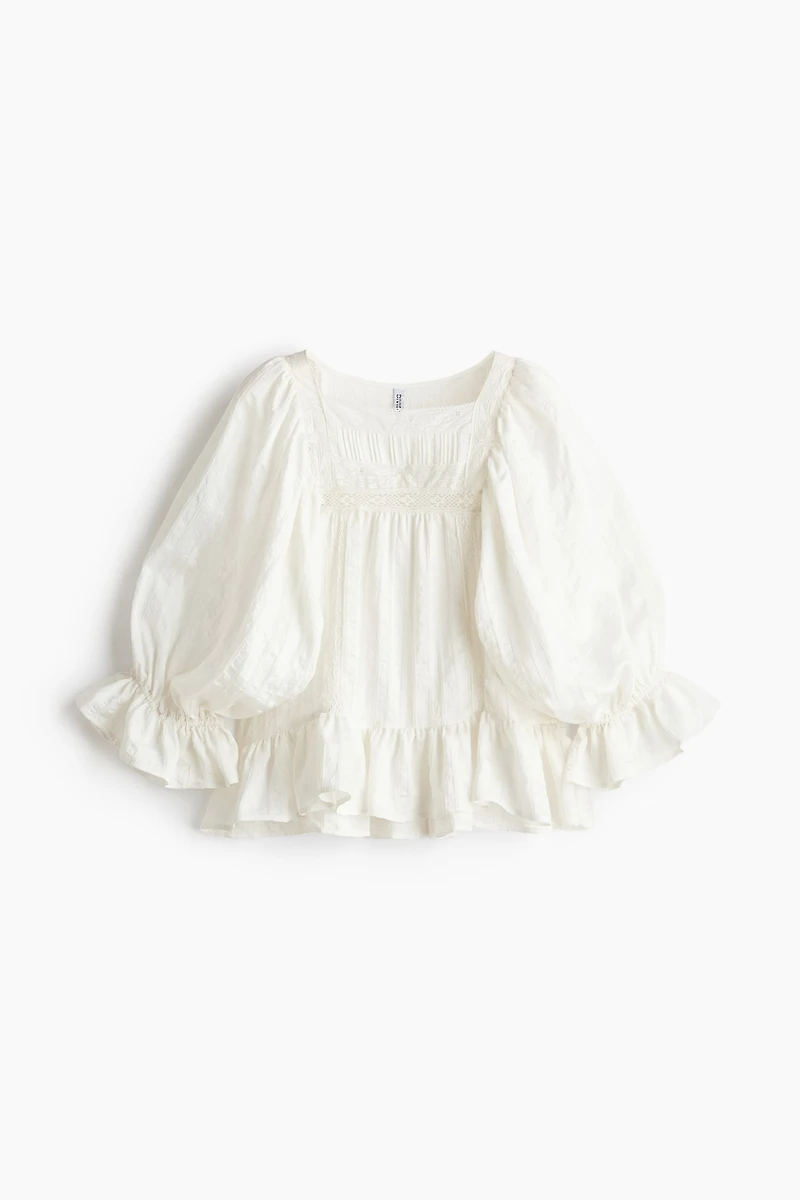 Blouse à manches bouffantes