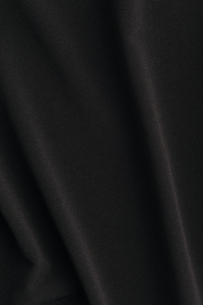 Haut asymétrique à effet drapé