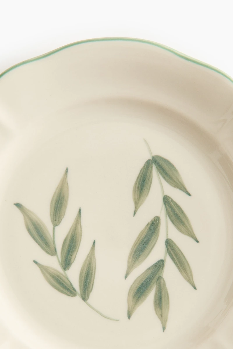 Petite assiette peinte à la main en grès cérame