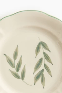 Petite assiette peinte à la main en grès cérame