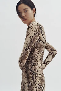 Robe en filet avec imprimé peau de serpent
