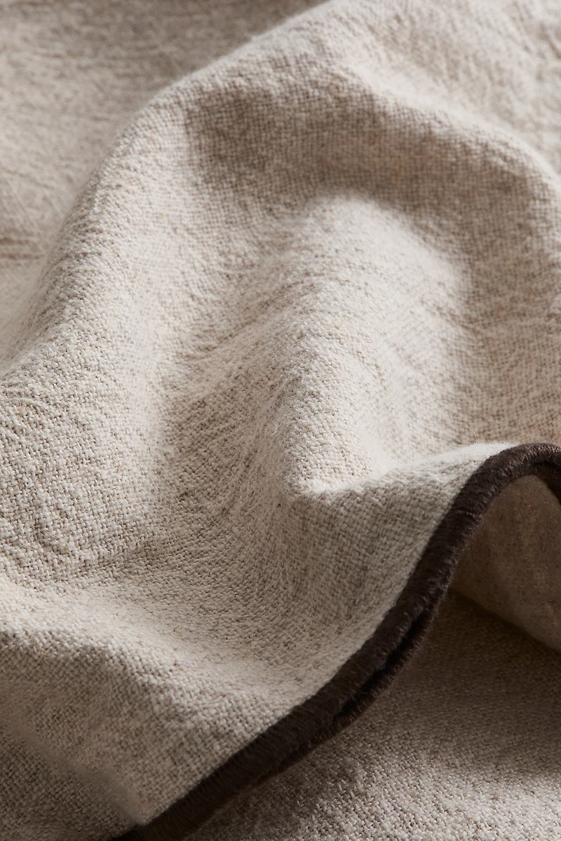 Housse de coussin en lin mélangé