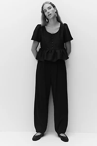 Blouse péplum en brocart